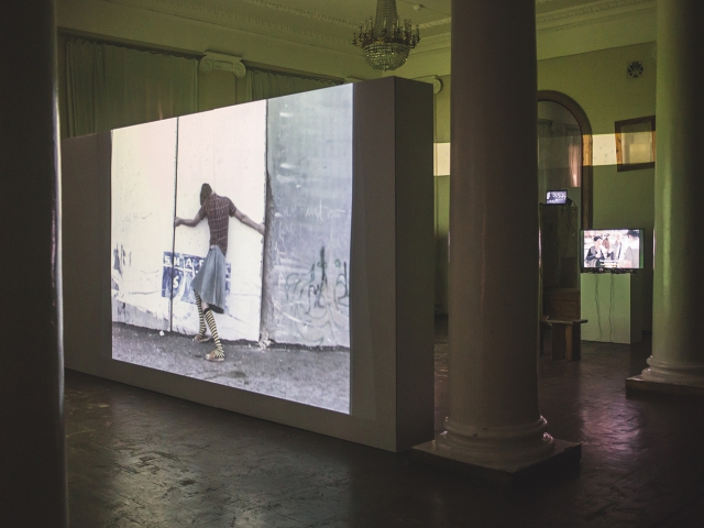 Rona Yefman, Pippi LongStockings, the strongest girl in the world, in Abu Dis, video, 2005-2006.  /De/Constructing Borders, instralation view. Photo: Vlad Lemm